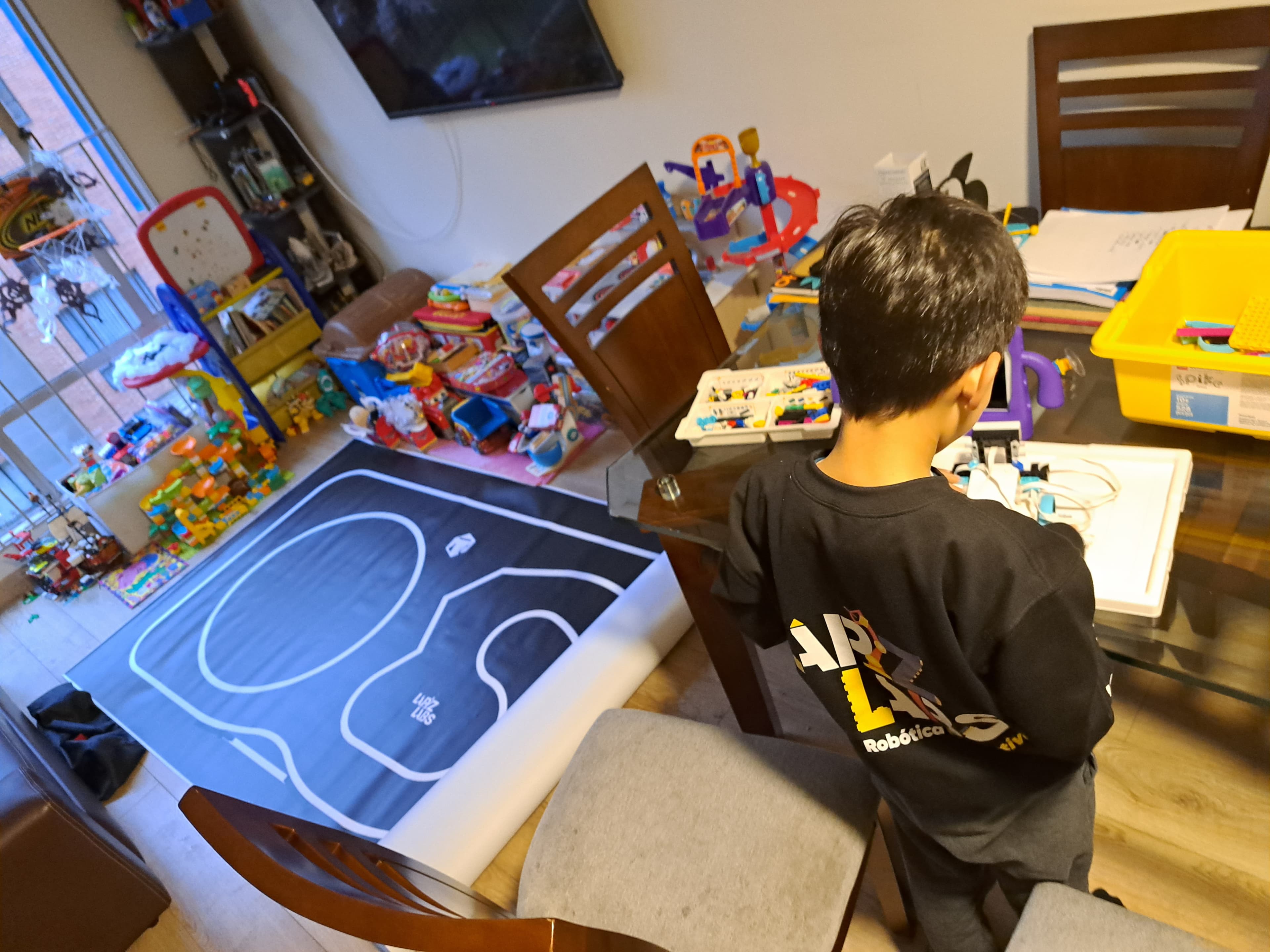 Students working on LEGO robotics projects